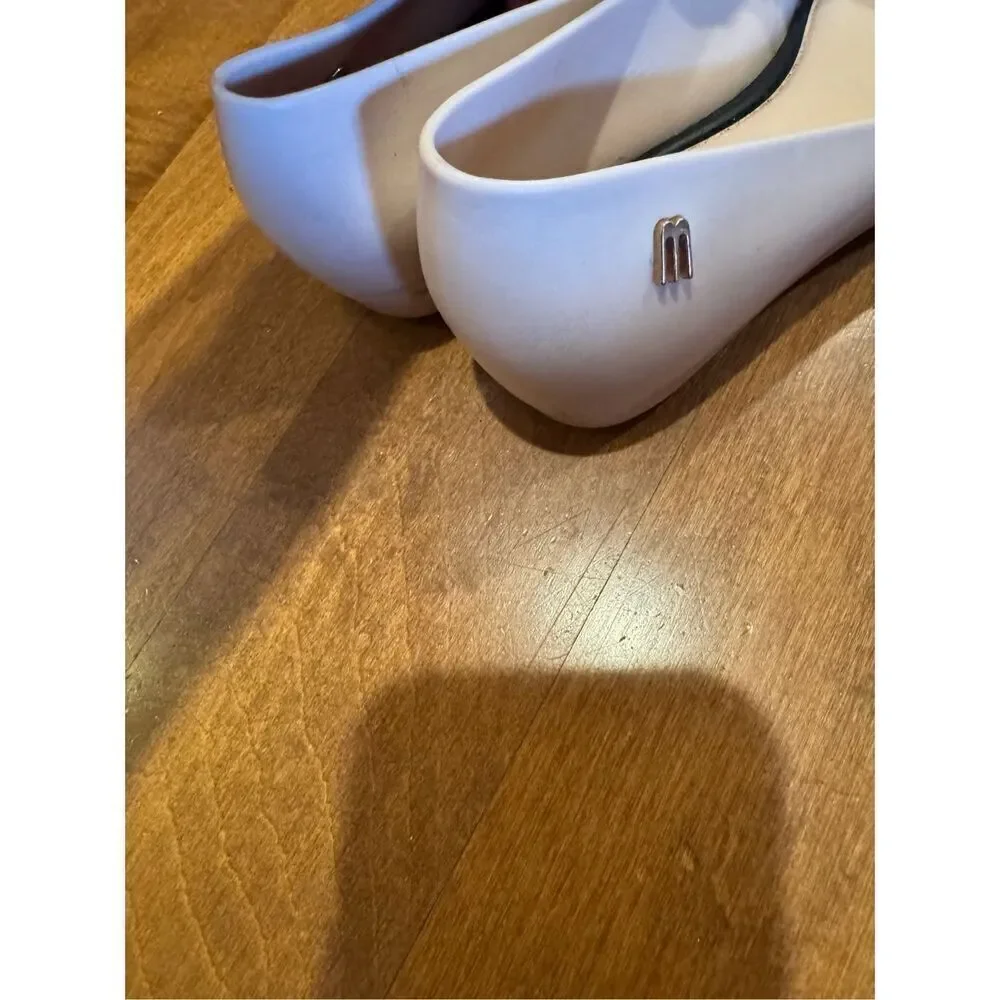 Little girl size one Melissa flats size one